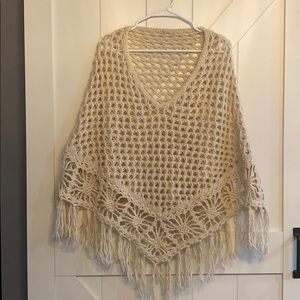 Crochet poncho with fringe